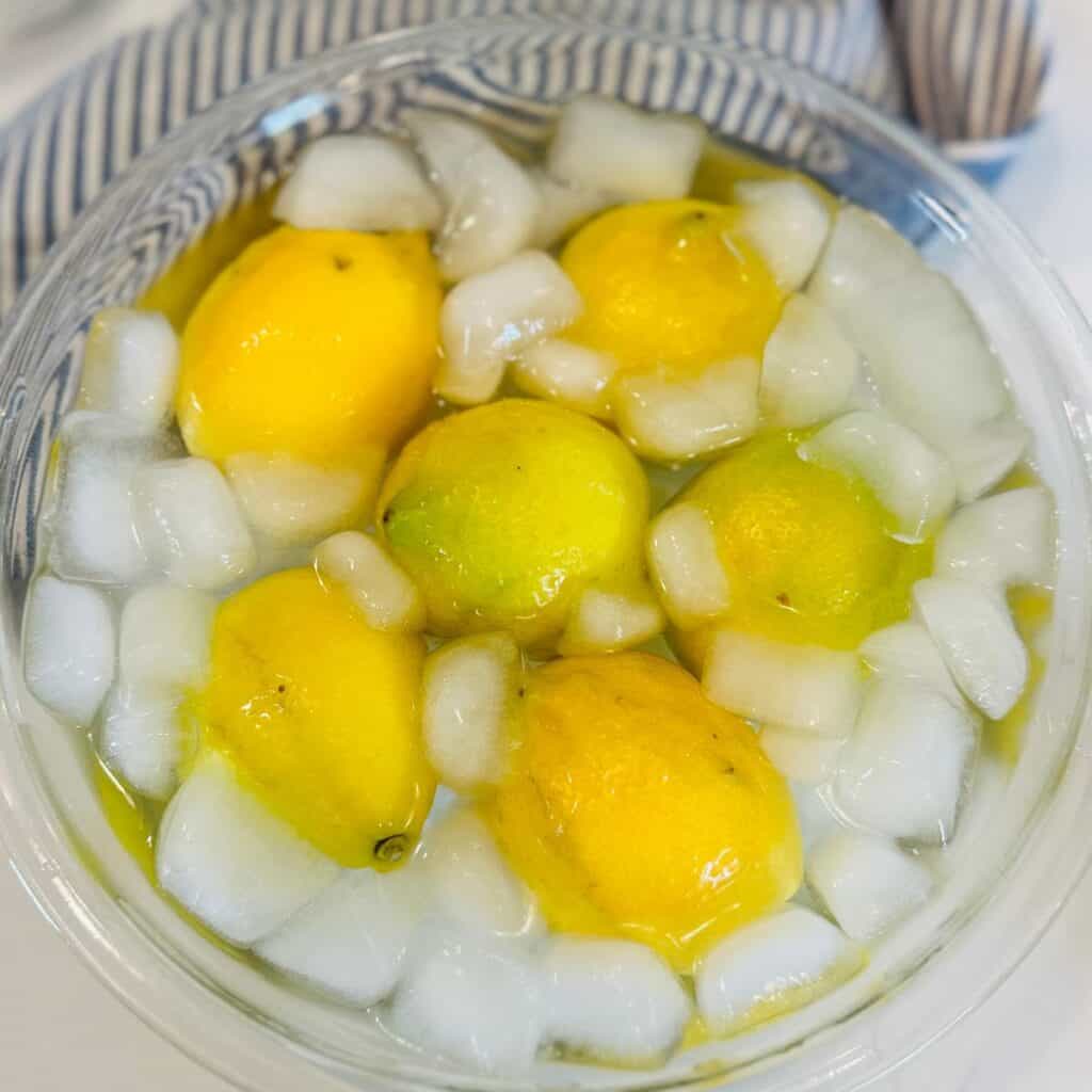 lemons in a bowl of ice water.