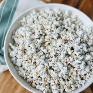 Pickle popcorn in a white bowl.