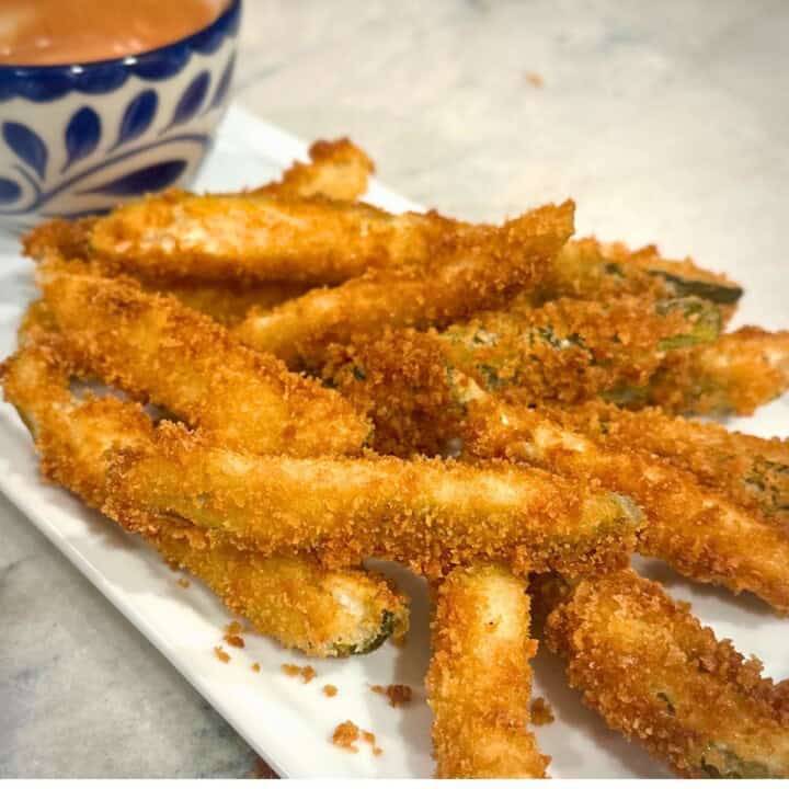 Fried Pickles on a white plate.
